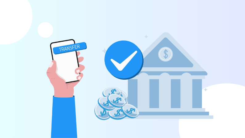 A Hand Holding a Smartphone Displaying 'TRANSFER,' with a Bank Building and Coins in the Background, Symbolizing Money Transfer